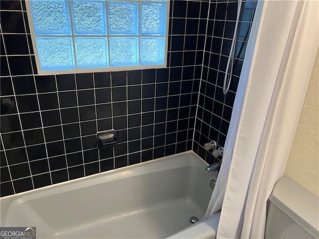 284 Lakeview Ave NE, Atlanta, GA 30305 - bathroom with shower / bath combo and toilet