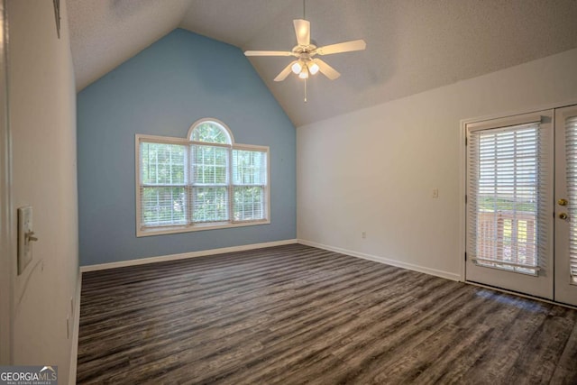 217 Bridgewater Trl, Canton, GA 30115 - spare room with dark wood-style flooring, lofted ceiling, and a ceiling fan