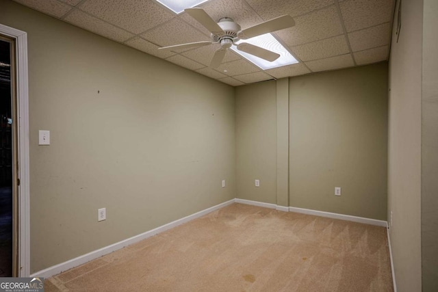 217 Bridgewater Trl, Canton, GA 30115 - empty room with a paneled ceiling, light colored carpet, and ceiling fan