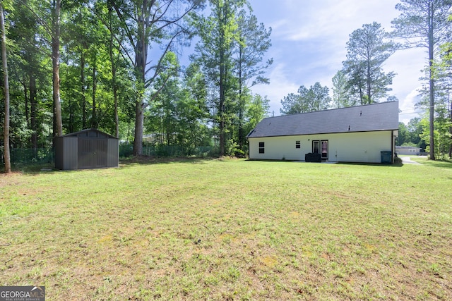 275 Bethlehem Church Rd, Carrollton, GA 30117 - view of grassy yard featuring a storage unit