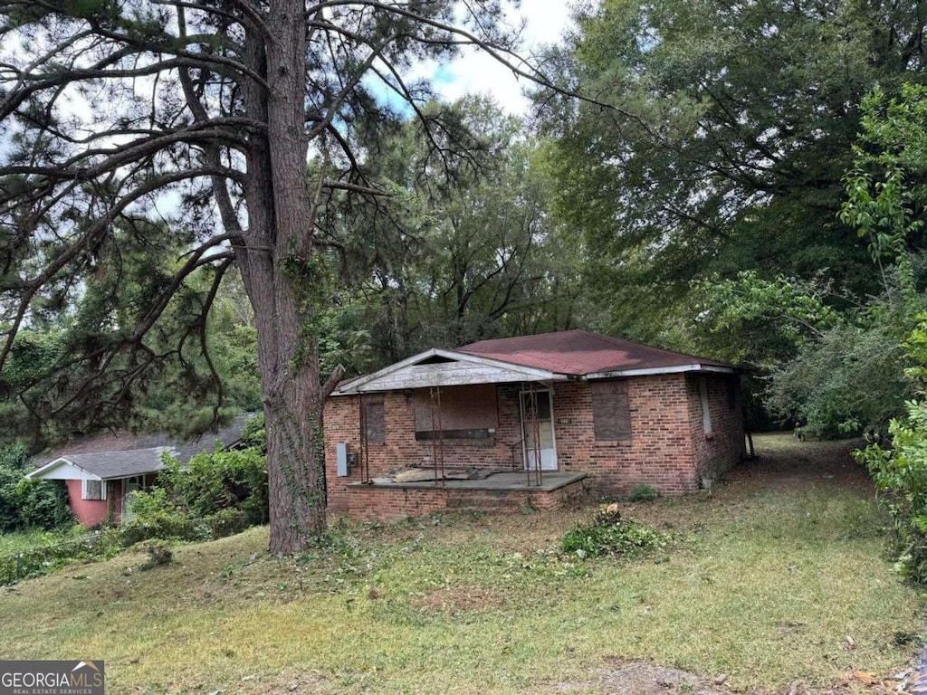 2119 Dove St, Macon, GA 31204 - view of outbuilding with a porch