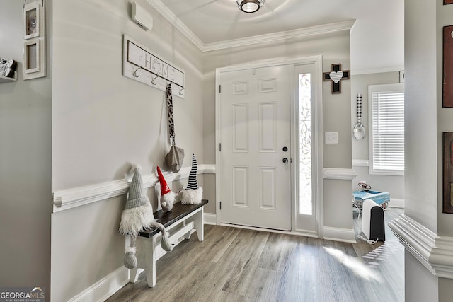 120 Mylee Cv, Barnesville, GA 30204 - entrance foyer featuring wood finished floors and crown molding