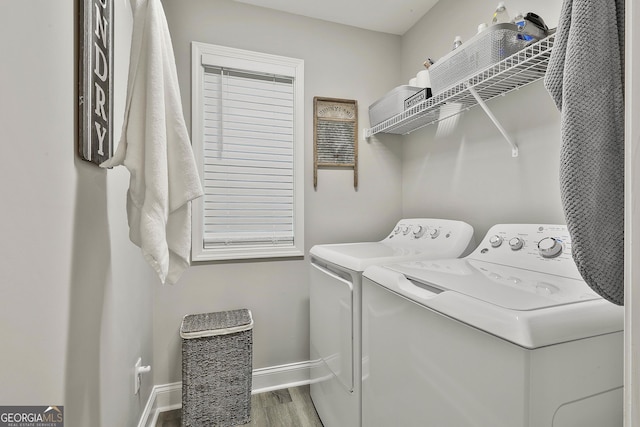 120 Mylee Cv, Barnesville, GA 30204 - laundry room with washer and dryer and wood finished floors