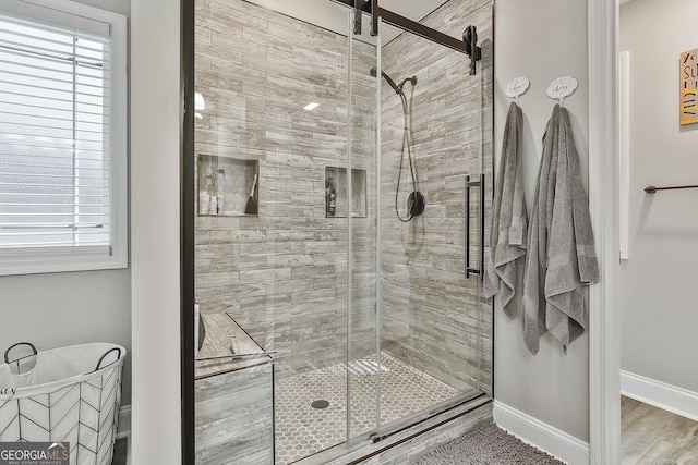 120 Mylee Cv, Barnesville, GA 30204 - bathroom featuring a shower stall and plenty of natural light