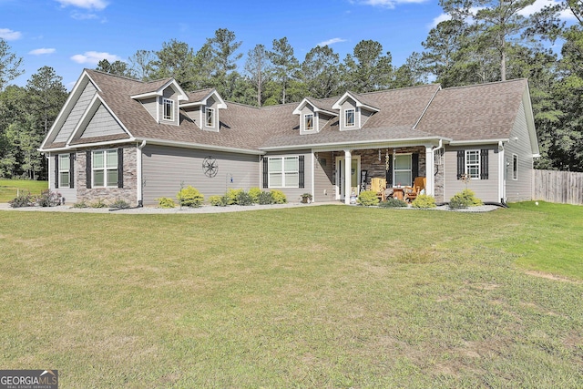 120 Mylee Cv, Barnesville, GA 30204 - new england style home featuring a porch, stone siding, and a shingled roof