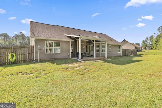120 Mylee Cv, Barnesville, GA 30204 - back of property with a patio, a fenced backyard, and roof with shingles