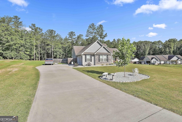 120 Mylee Cv, Barnesville, GA 30204 - view of front of home with driveway and a front lawn