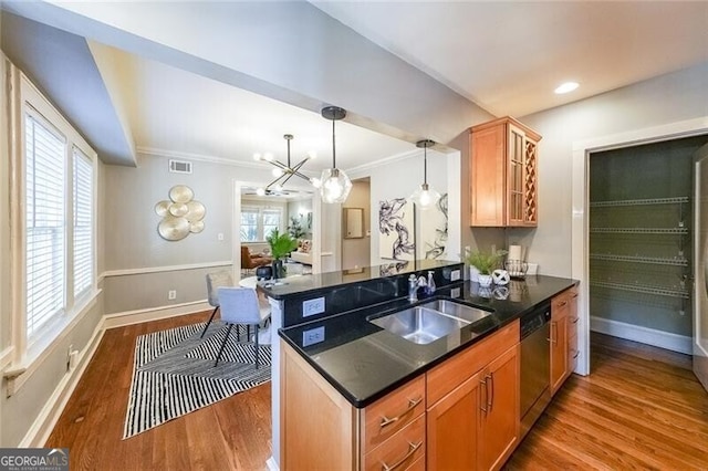 2 Collier Rd NW Unit 5, Atlanta, GA 30309 - kitchen with stainless steel dishwasher, wood finished floors, ornamental molding, glass insert cabinets, and a chandelier
