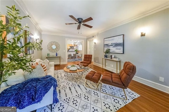 2 Collier Rd NW Unit 5, Atlanta, GA 30309 - living area featuring wood finished floors, ceiling fan, and crown molding