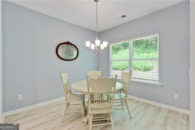 286 Kimberleys Xing, Jasper, GA 30143 - dining area featuring wood finished floors and a chandelier