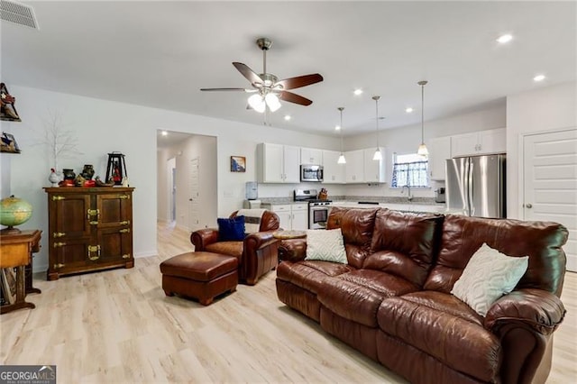 286 Kimberleys Xing, Jasper, GA 30143 - living room featuring a ceiling fan, light wood finished floors, and recessed lighting