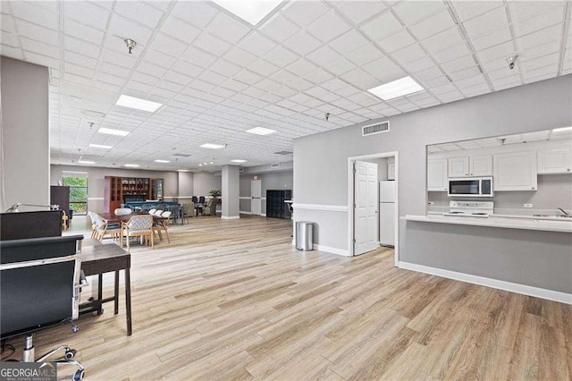 383 Ralph Mcgill Blvd NE Unit J, Atlanta, GA 30312 - office area featuring light wood finished floors and a drop ceiling