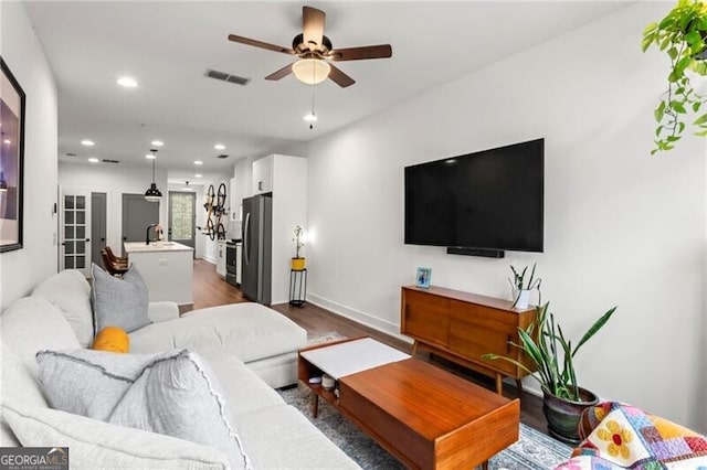 12 Becker Pl NW, Atlanta, GA 30307 - living room with ceiling fan, dark wood finished floors, and recessed lighting