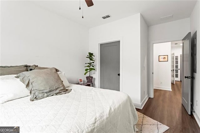 12 Becker Pl NW, Atlanta, GA 30307 - bedroom featuring dark wood-type flooring and ceiling fan