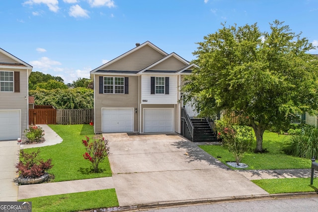 7 Springwater Dr, Port Wentworth, GA 31407 - view of front of property with a garage, concrete driveway, and stairway