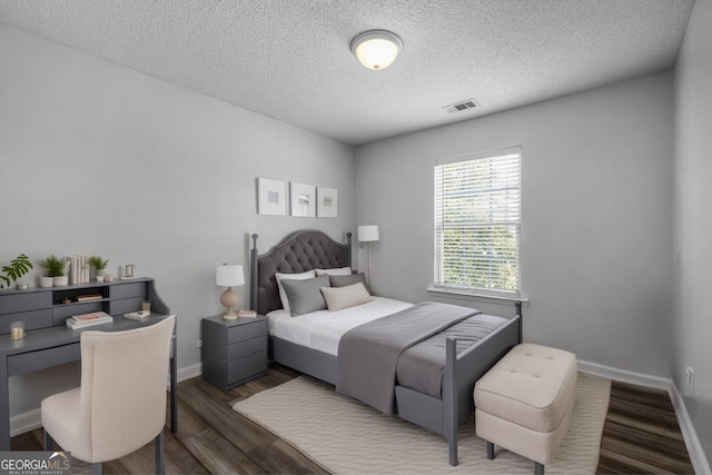 7 Springwater Dr, Port Wentworth, GA 31407 - bedroom featuring wood finished floors and a textured ceiling