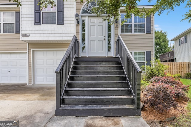 7 Springwater Dr, Port Wentworth, GA 31407 - property entrance with concrete driveway and an attached garage