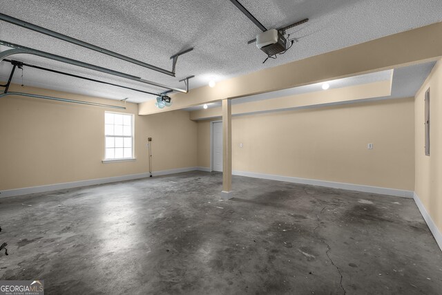 7 Springwater Dr, Port Wentworth, GA 31407 - garage with a garage door opener and baseboards