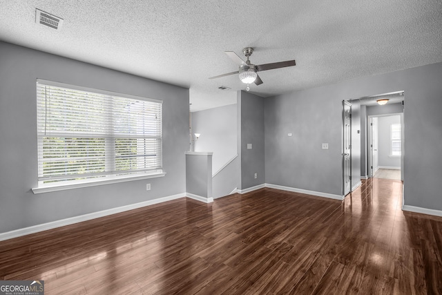 7 Springwater Dr, Port Wentworth, GA 31407 - unfurnished living room featuring ceiling fan, wood finished floors, and a textured ceiling
