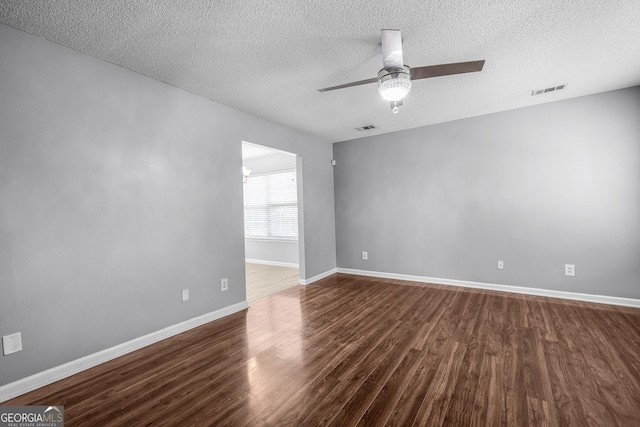 7 Springwater Dr, Port Wentworth, GA 31407 - empty room with a ceiling fan, dark wood-type flooring, and a textured ceiling