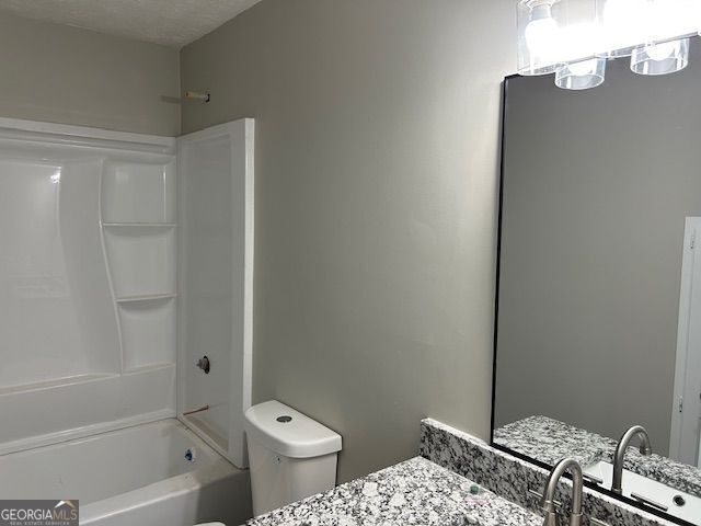 433 Rhett Dr, Loganville, GA 30052 - full bath featuring shower / washtub combination and vanity