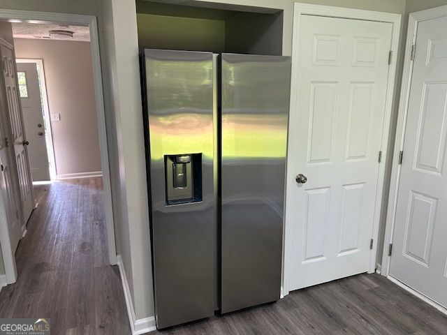 433 Rhett Dr, Loganville, GA 30052 - kitchen with stainless steel fridge and dark wood-type flooring