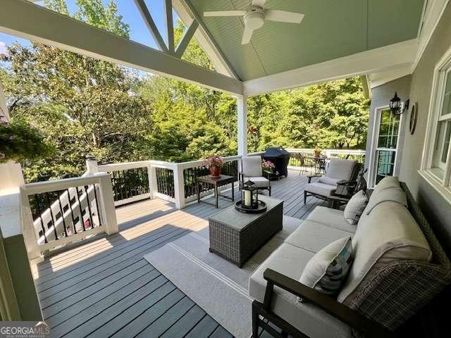 5085 Johns Creek Ct, Johns Creek, GA 30022 - wooden deck featuring ceiling fan and outdoor lounge area