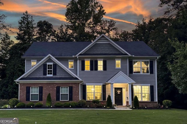 325 Paces Dr, Lithia Springs, GA 30122 - view of front of property featuring a lawn and brick siding