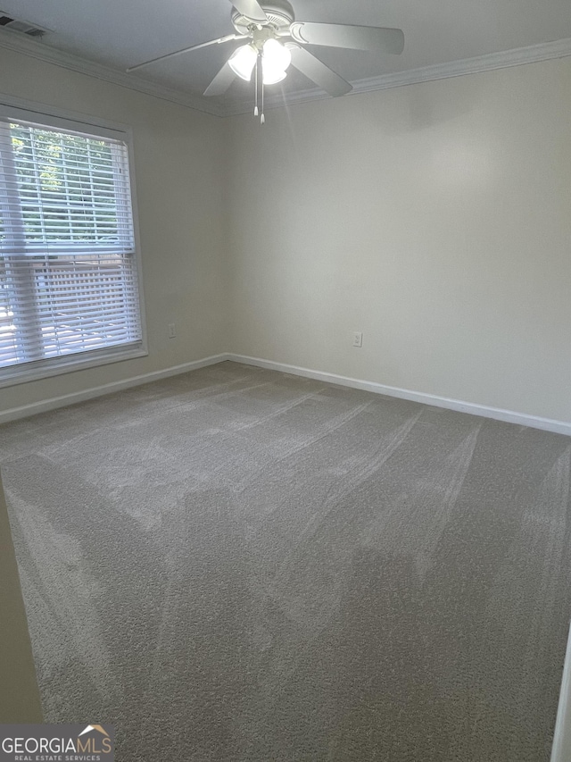 1833 Phillips Ave, East Point, GA 30344 - empty room with crown molding, ceiling fan, and carpet flooring