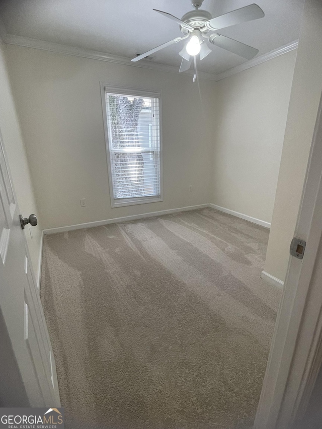 1833 Phillips Ave, East Point, GA 30344 - spare room with ornamental molding, carpet, and ceiling fan
