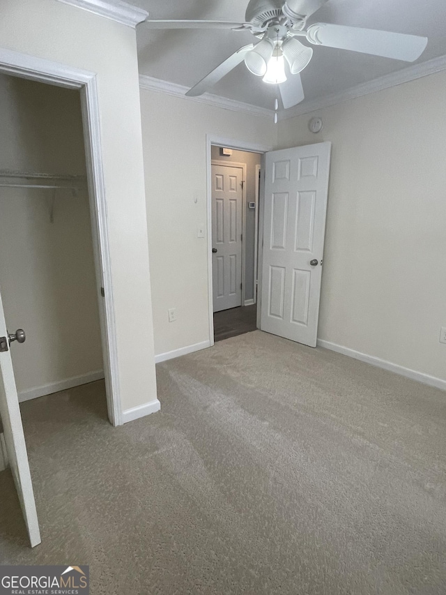 1833 Phillips Ave, East Point, GA 30344 - unfurnished bedroom featuring ornamental molding, carpet floors, a closet, and ceiling fan