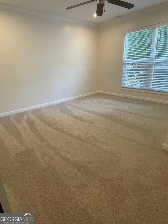 1833 Phillips Ave, East Point, GA 30344 - carpeted spare room with ornamental molding and ceiling fan