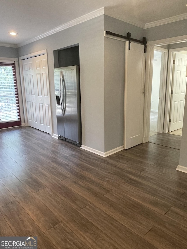1833 Phillips Ave, East Point, GA 30344 - spare room with ornamental molding, a barn door, dark wood-type flooring, and recessed lighting