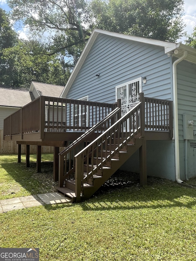 1833 Phillips Ave, East Point, GA 30344 - rear view of house with a wooden deck, a lawn, stairway, and a shingled roof