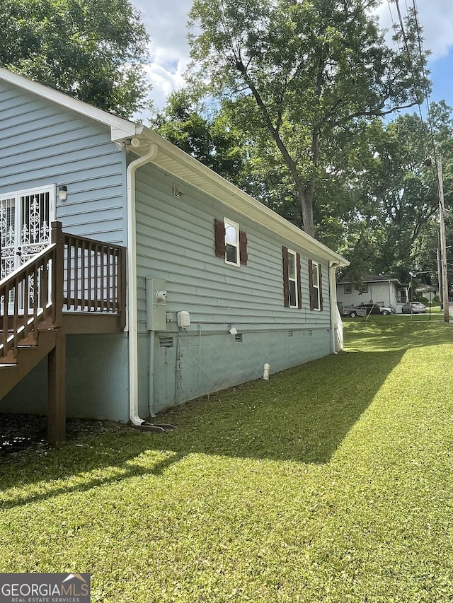 1833 Phillips Ave, East Point, GA 30344 - view of home's exterior with a yard, crawl space, and a deck