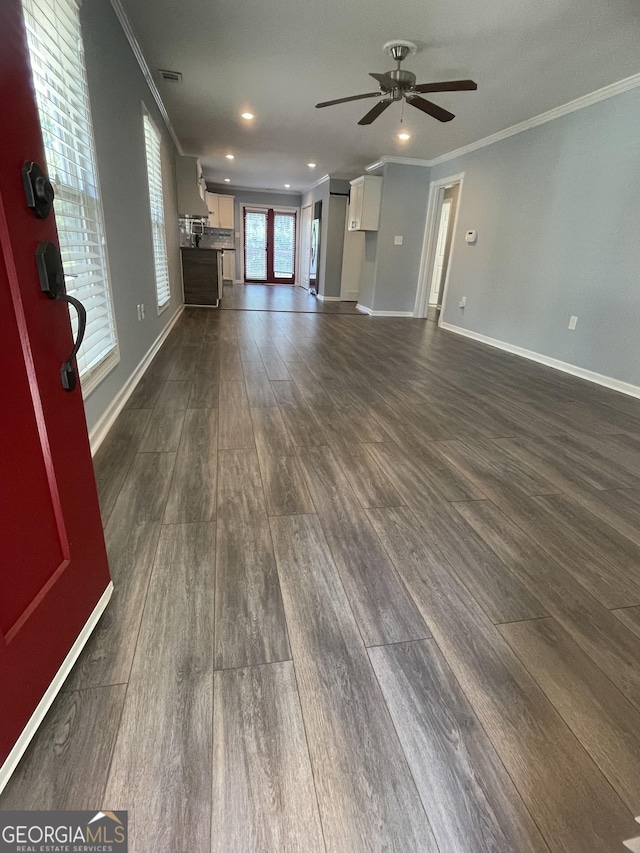 1833 Phillips Ave, East Point, GA 30344 - unfurnished living room with ornamental molding, dark wood-type flooring, ceiling fan, and recessed lighting