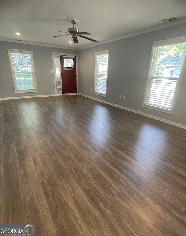 1833 Phillips Ave, East Point, GA 30344 - unfurnished living room featuring dark wood-style flooring, ornamental molding, and ceiling fan