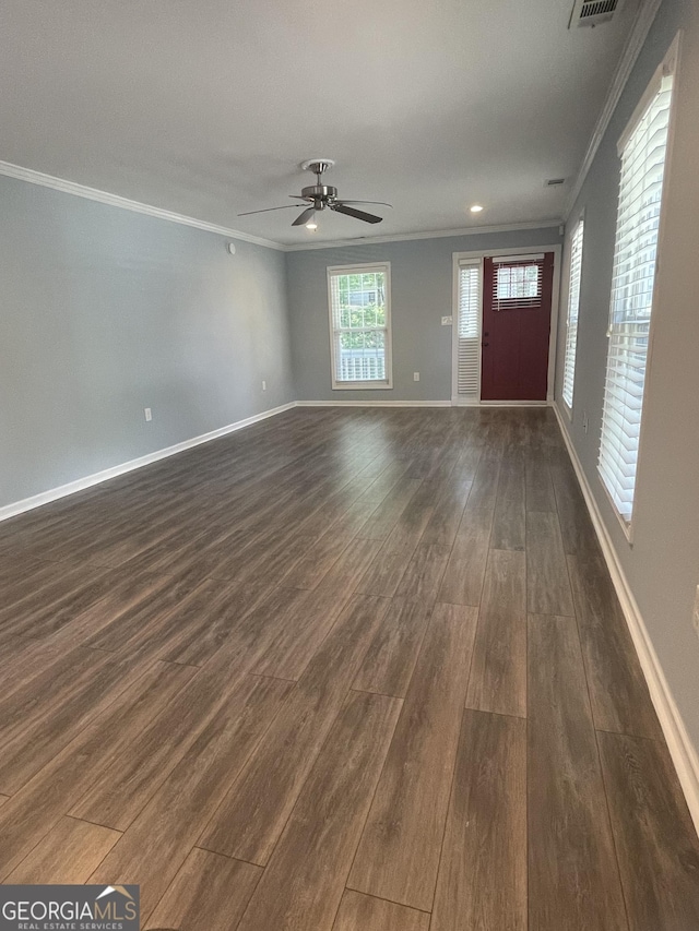 1833 Phillips Ave, East Point, GA 30344 - unfurnished living room with crown molding, dark wood-style flooring, and ceiling fan