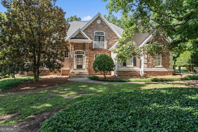 914 Champions Way, Mcdonough, GA 30252 - view of front of house with a front lawn and stone siding