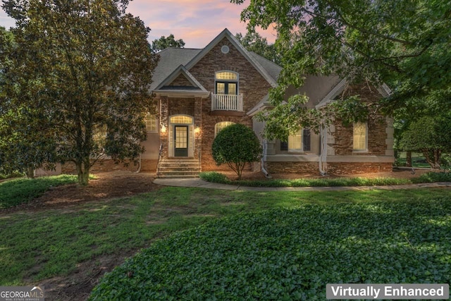 914 Champions Way, Mcdonough, GA 30252 - view of front of house with a lawn and stone siding