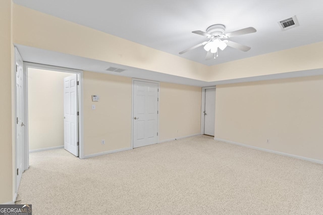 914 Champions Way, Mcdonough, GA 30252 - unfurnished bedroom with light carpet and a ceiling fan