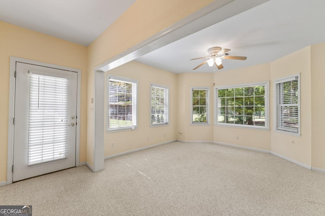 914 Champions Way, Mcdonough, GA 30252 - unfurnished room with ceiling fan, carpet floors, and plenty of natural light