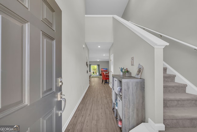 264 Golden Eagle Pkwy, Braselton, GA 30517 - entrance foyer featuring light wood-style flooring, stairway, and recessed lighting