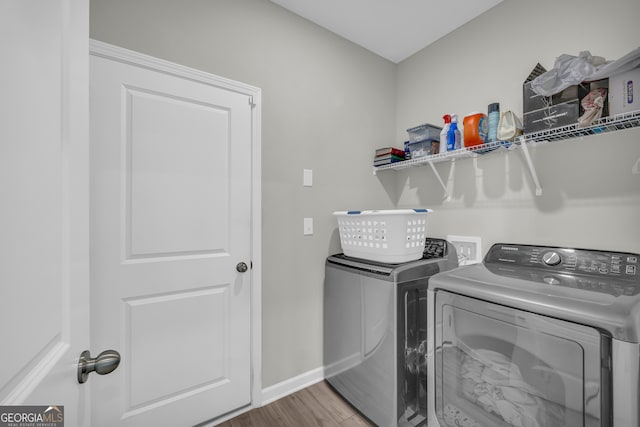 264 Golden Eagle Pkwy, Braselton, GA 30517 - laundry area featuring washer and dryer and wood finished floors