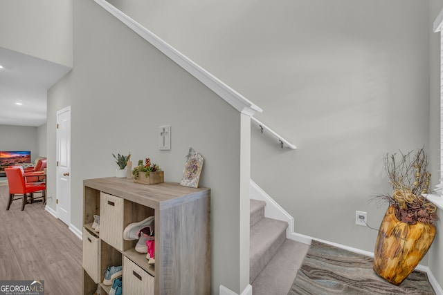 264 Golden Eagle Pkwy, Braselton, GA 30517 - staircase with wood finished floors and recessed lighting
