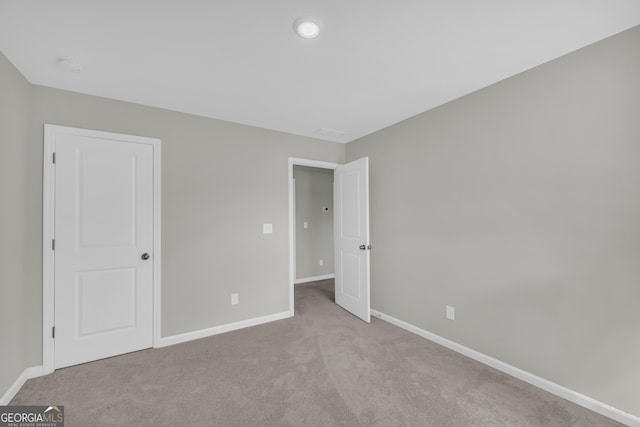 264 Golden Eagle Pkwy, Braselton, GA 30517 - unfurnished bedroom featuring baseboards and carpet flooring
