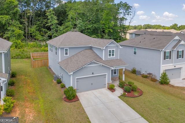 264 Golden Eagle Pkwy, Braselton, GA 30517 - traditional-style home with concrete driveway, an attached garage, a shingled roof, and a front lawn