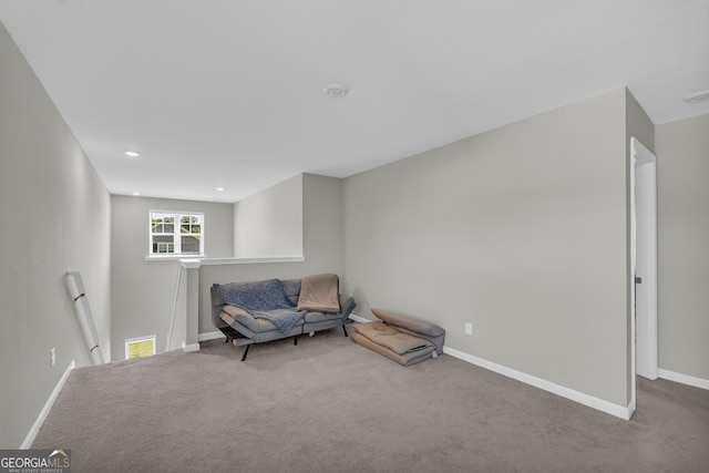 264 Golden Eagle Pkwy, Braselton, GA 30517 - sitting room with an upstairs landing, carpet, and recessed lighting