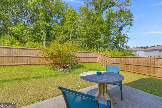 264 Golden Eagle Pkwy, Braselton, GA 30517 - fenced backyard with a patio