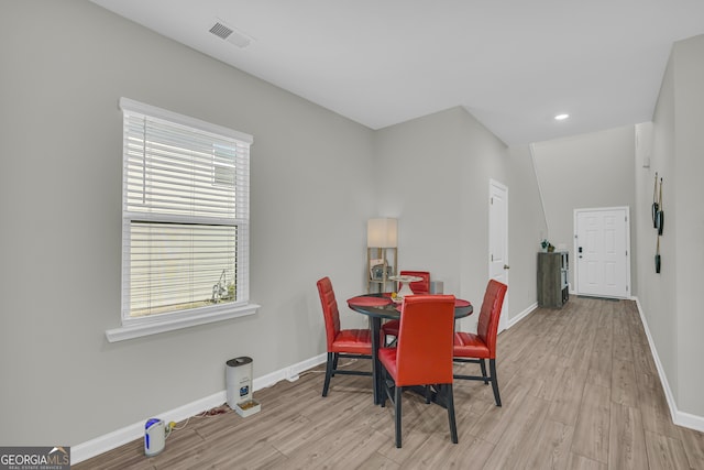 264 Golden Eagle Pkwy, Braselton, GA 30517 - dining area with wood finished floors and recessed lighting